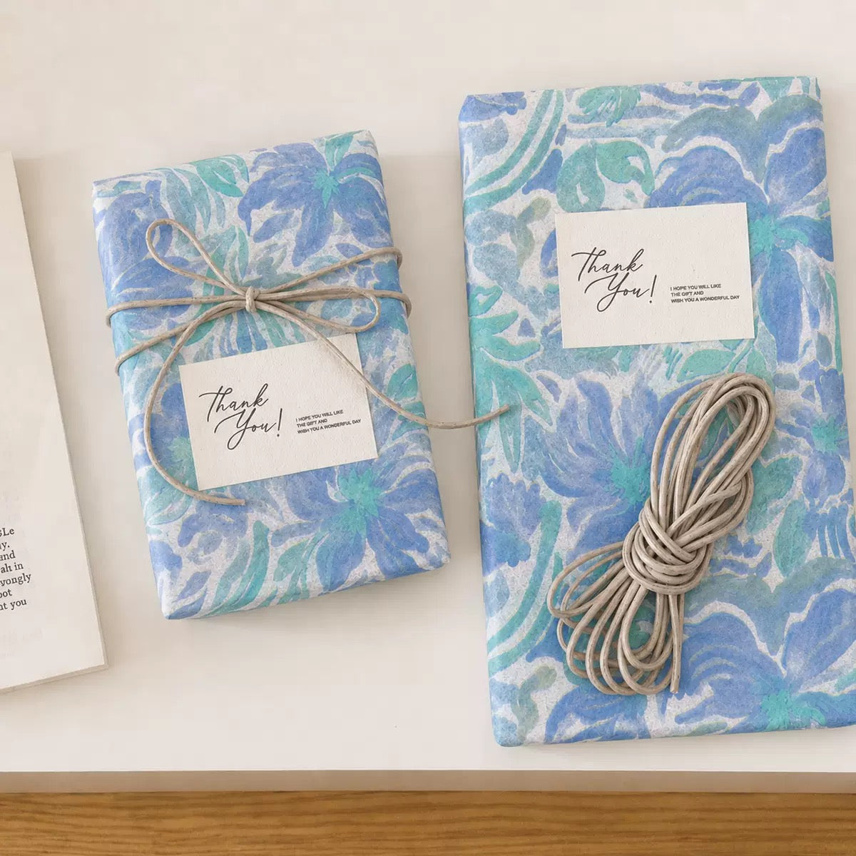 Blue tissue paper gift wrapping with cord